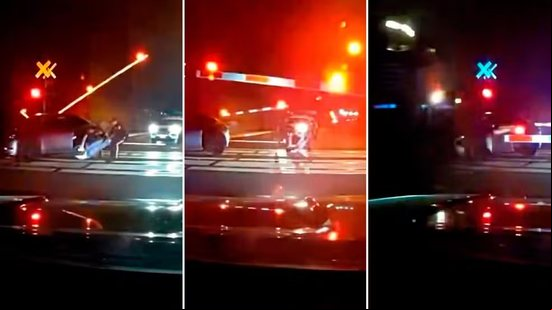 Polícia resgata motorista bêbado momentos antes de trem atingir o carro - Reprodução / Polícia de Piscataway