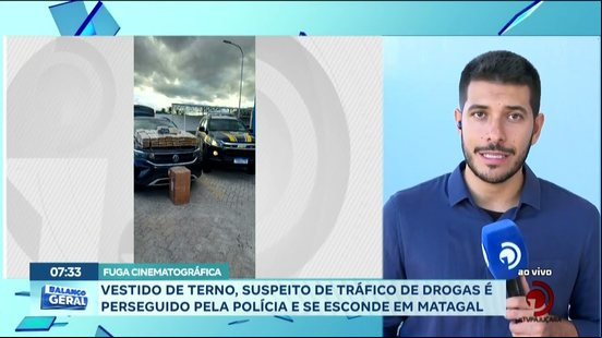 Vestido de terno, suspeito de tráfico de drogas é perseguido pela polícia e se esconde em Matagal